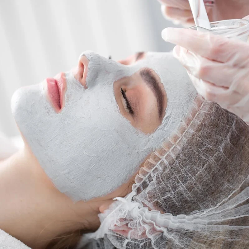 Face peeling mask, spa beauty treatment, skincare. Woman getting Skinduced Signature Facial Newcastle
